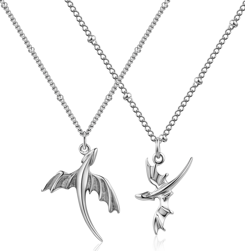 Crafting intricate dragon pendants, featuring jade and gold designs for bold jewelry.